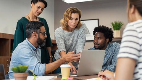 People working on a computer